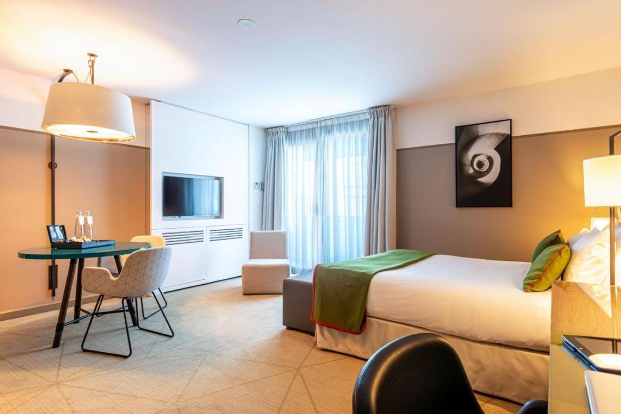 קורבוו Fraser Suites Paris La Defense מראה חיצוני תמונה A room at the hotel
