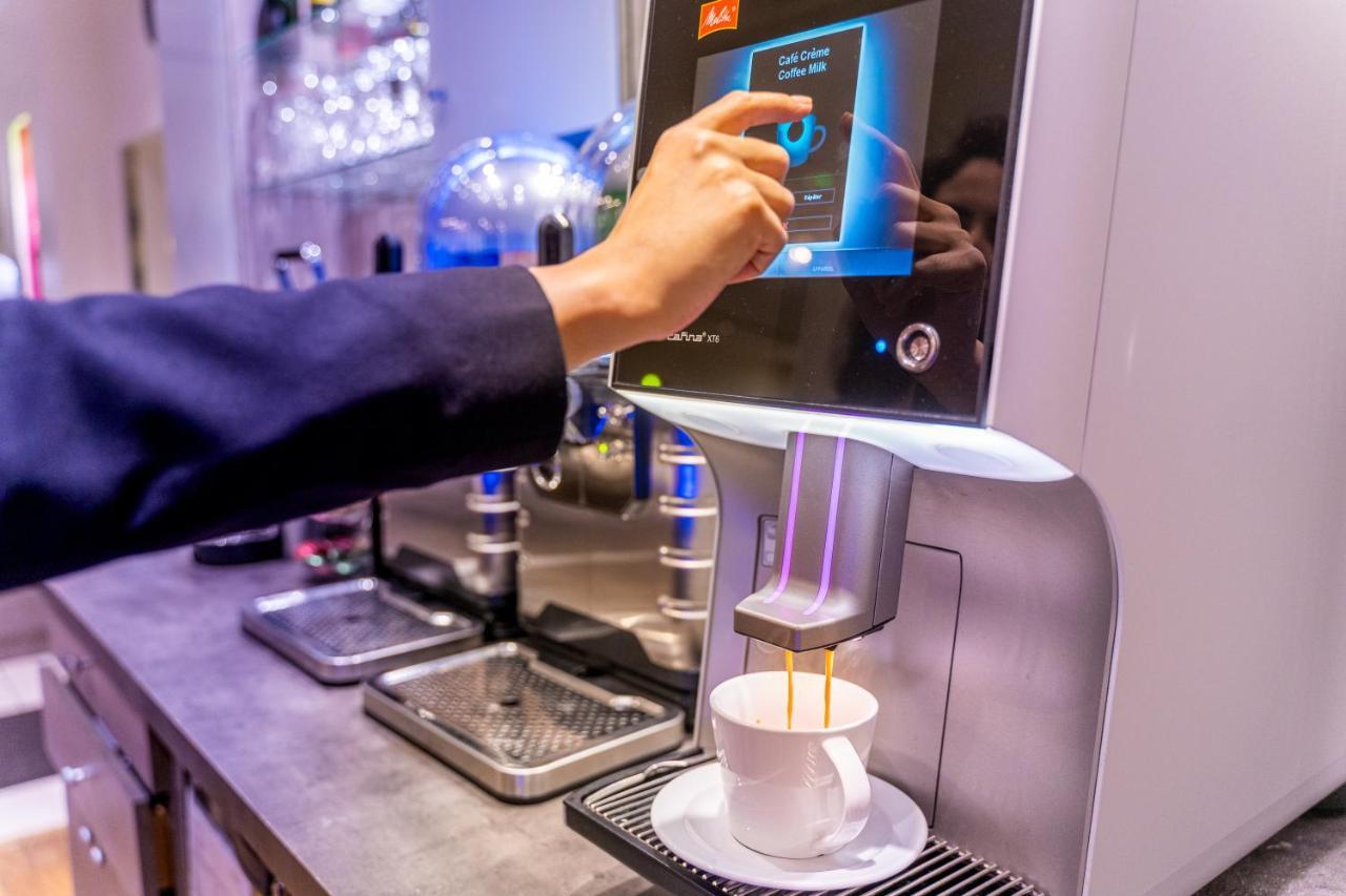 קורבוו Fraser Suites Paris La Defense מראה חיצוני תמונה A coffee machine
